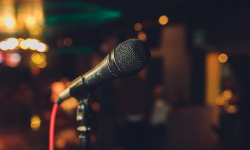 Close up of microphone in concert hall or conference room